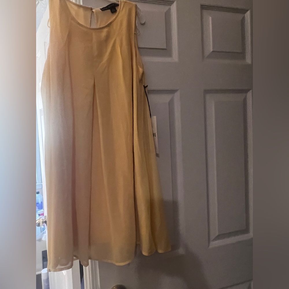 Brand new with tags, Beautiful chiffon yellow mini dress.